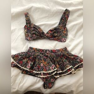 Monce Mara floral bikini:  Kayla top 
Ruffle Hot short with trim bottom